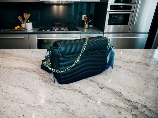 Elevate Daily Style with Our Timeless Black Leather Crossbody Bag -