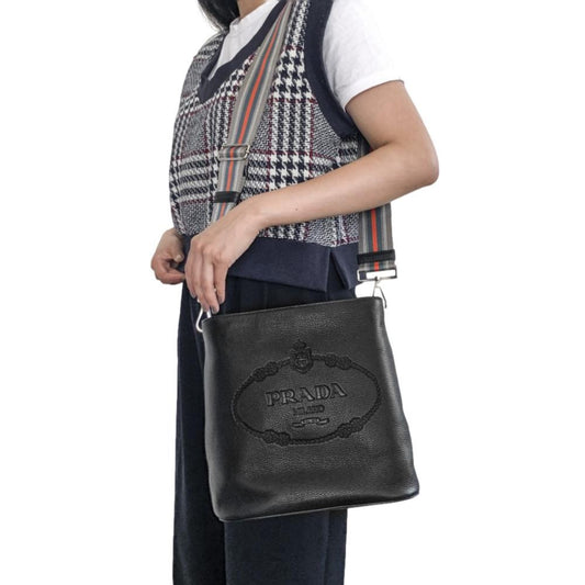 Prada Black Leather Bucket Bag - Stylish Crossbody & Web Strap - Shop Bags LLC