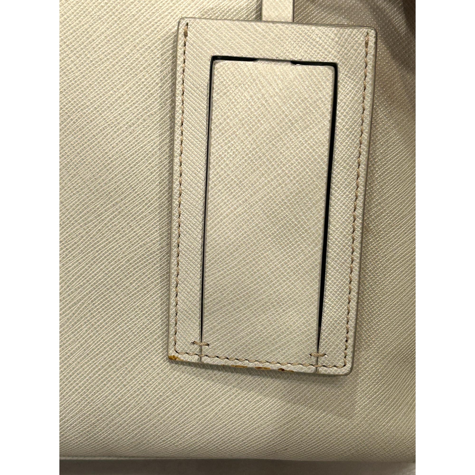 Prada’s Saffiano Leather Satchel in Ivory - Stylish & Practical Tote -   Shop Bags