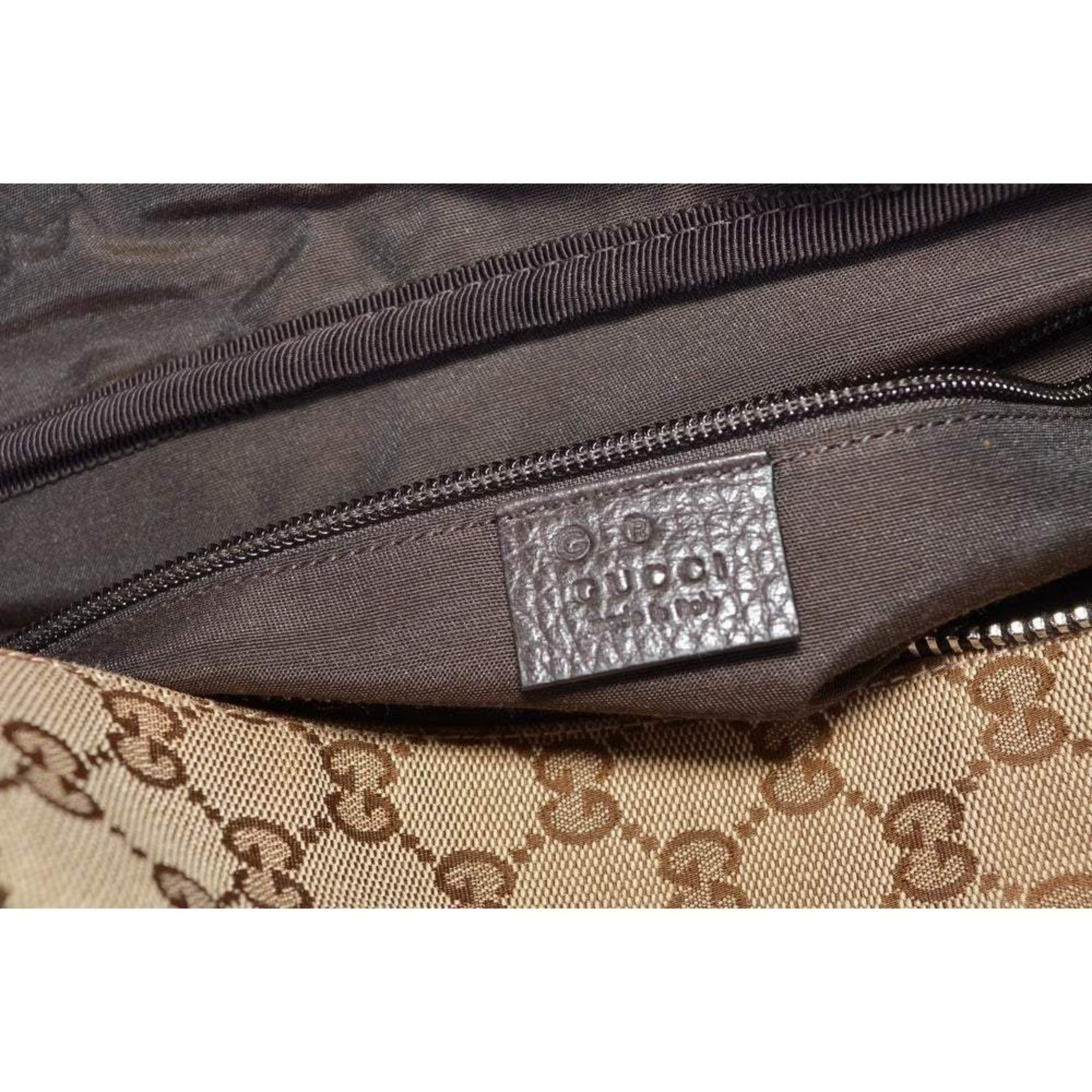 Luxury Gucci Duffle Bag: Stylish Travel in Beige Canvas & Leather