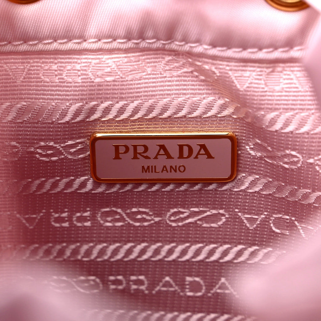Chic & Sustainable: Prada Pink Re-Nylon Bucket Crossbody Bag -   Shop Bags LLC