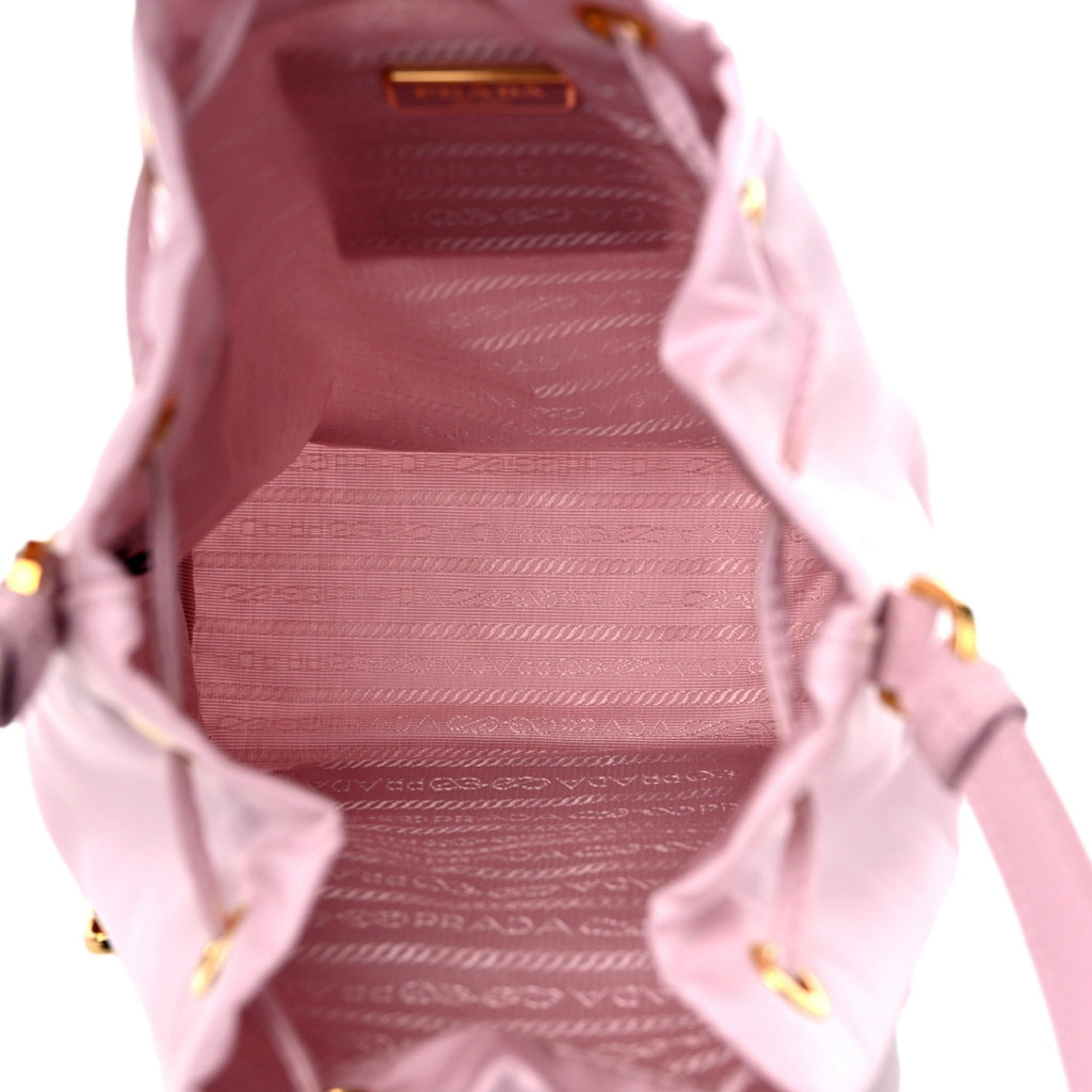 Chic & Sustainable: Prada Pink Re-Nylon Bucket Crossbody Bag -   Shop Bags LLC