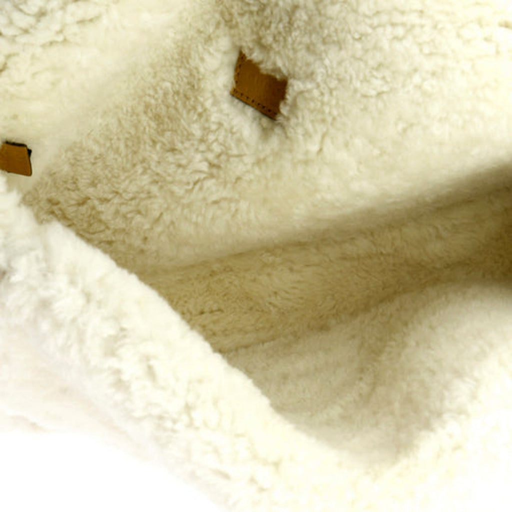 Gucci Dionysus Bag: Luxurious Suede & Shearling Elegance -   Shop Bags LLC