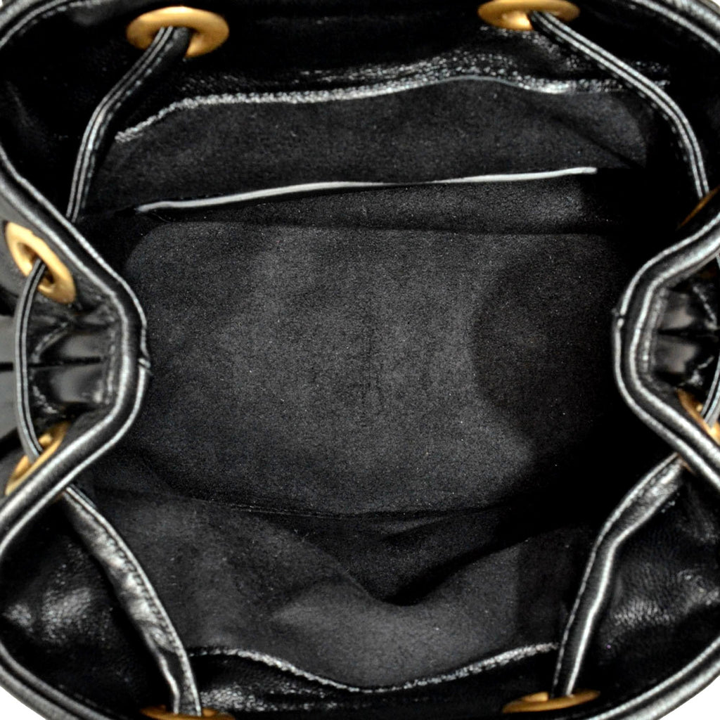 Gucci GG Marmont Backpack: Luxurious Black Quilted Leather Style -   Shop Bags LLC 