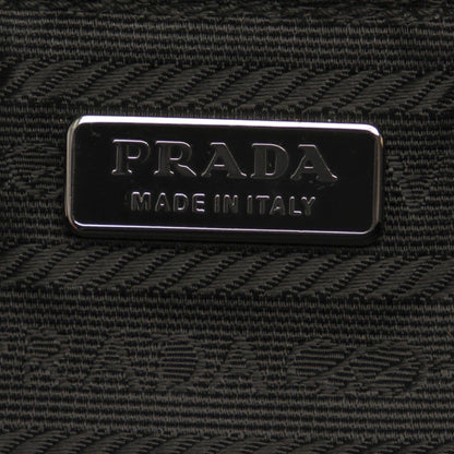 Prada Black Tessuto Nylon Wristlet Clutch - Sleek & Functional Design -   Shop Bags LLC
