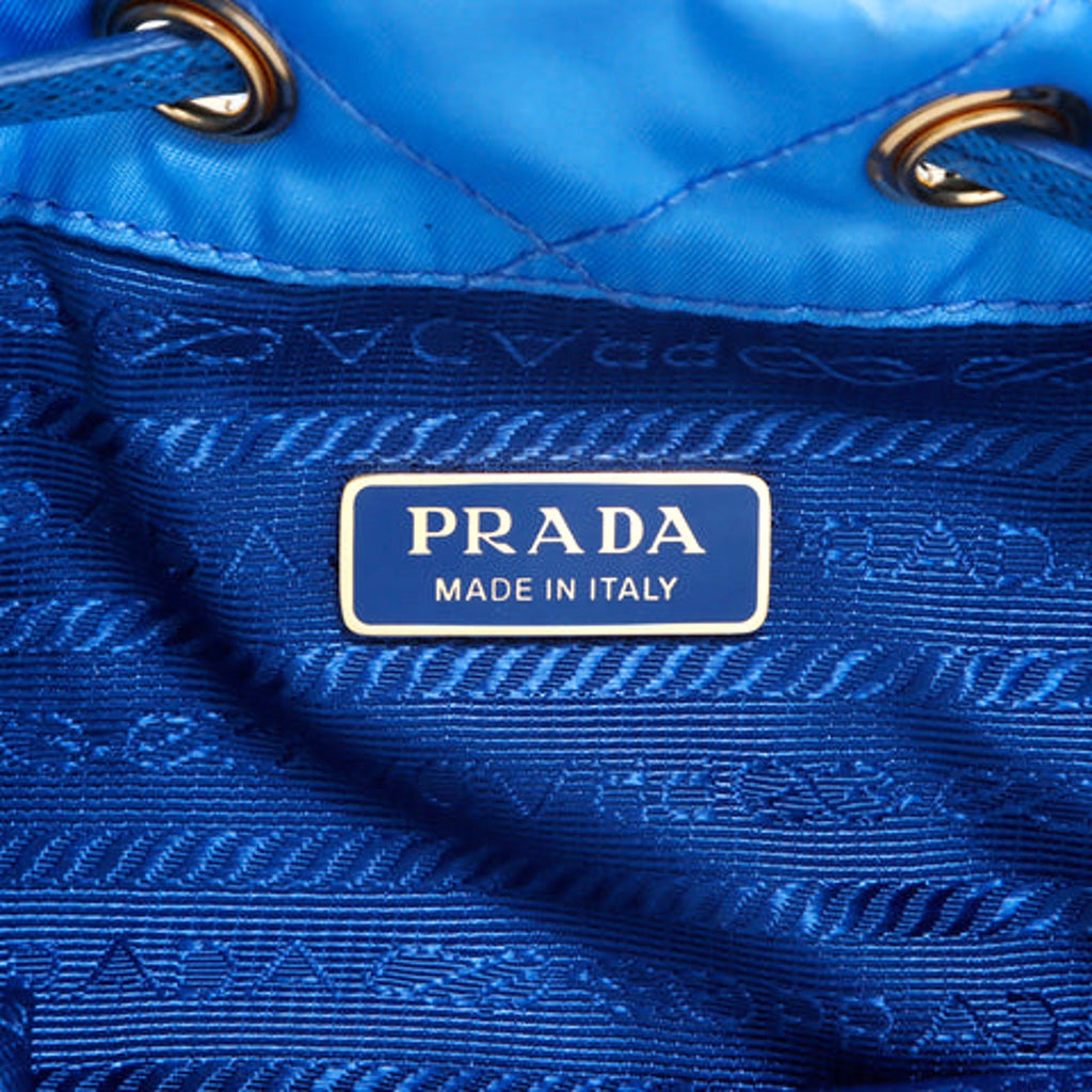 Prada Blue Quilted Nylon Bucket Bag - Luxury & Versatile Design -   Shop Bags LLC