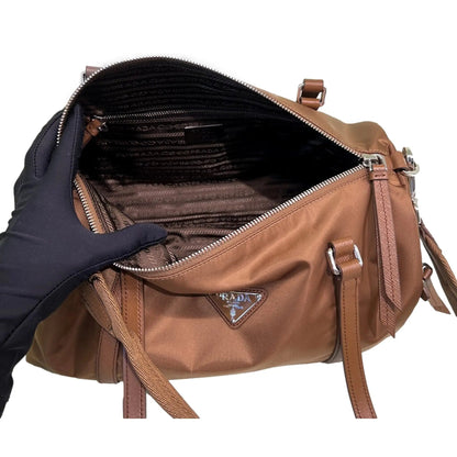 Prada Brown Small Duffel Bag: Elevate Travel Elegance in Style -   Shop Bags LLC