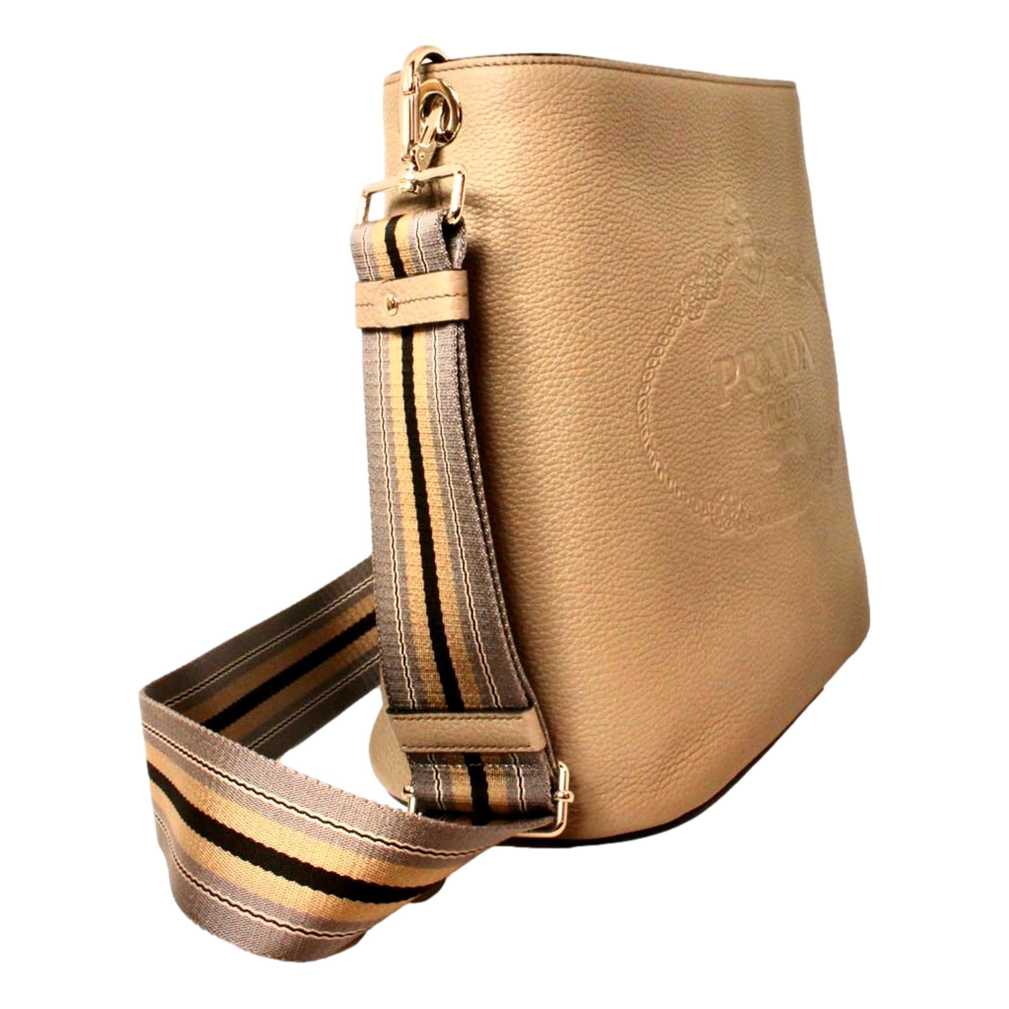 Prada Bucket Bag: Stylish Vitello Phenix Leather with Stripe Strap -   Shop Bags LLC 