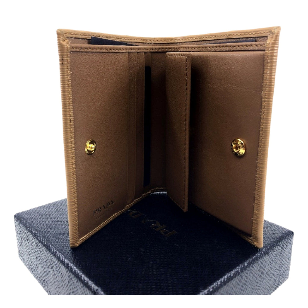 Prada Leather Bifold Wallet: Elegant Design & Practical Functionality -   Shop Bags LLC 