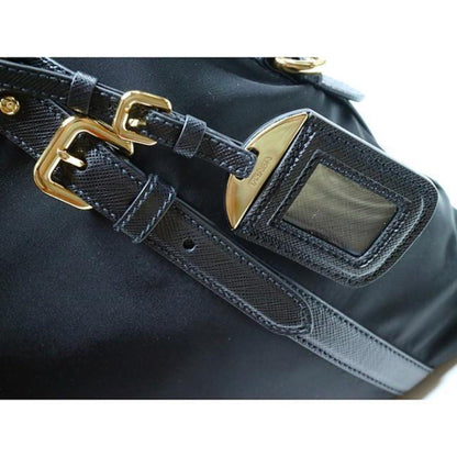 Prada Nylon & Saffiano Leather Satchel Bag - Elegant & Versatile -   Shop Bags LLC