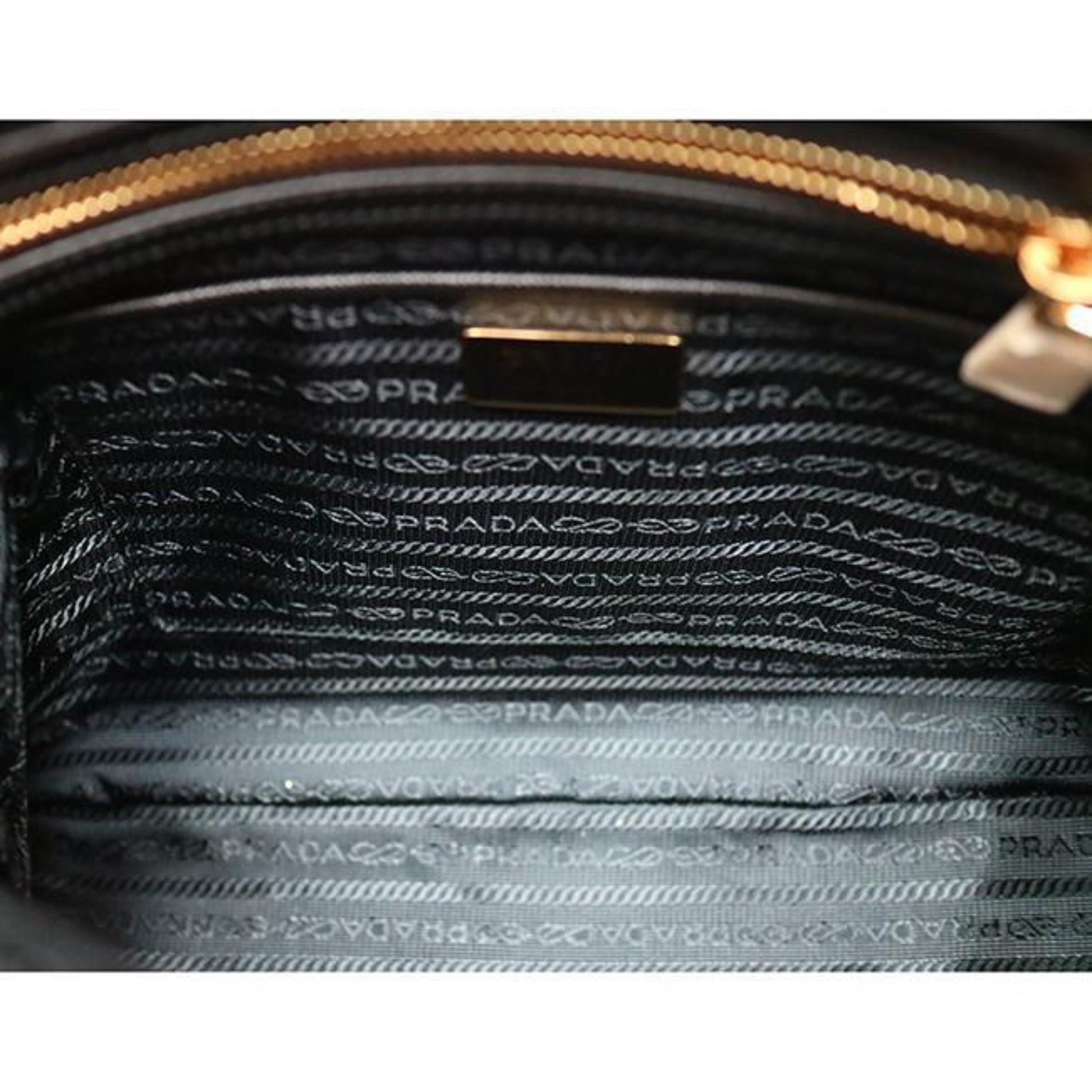 Prada Nylon & Saffiano Leather Satchel Bag - Elegant & Versatile -   Shop Bags LLC