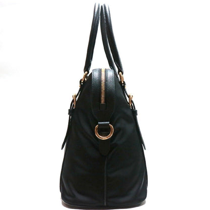 Prada Nylon & Saffiano Leather Satchel Bag - Elegant & Versatile -   Shop Bags LLC