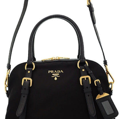 Prada Nylon & Saffiano Leather Satchel Bag - Elegant & Versatile -   Shop Bags LLC