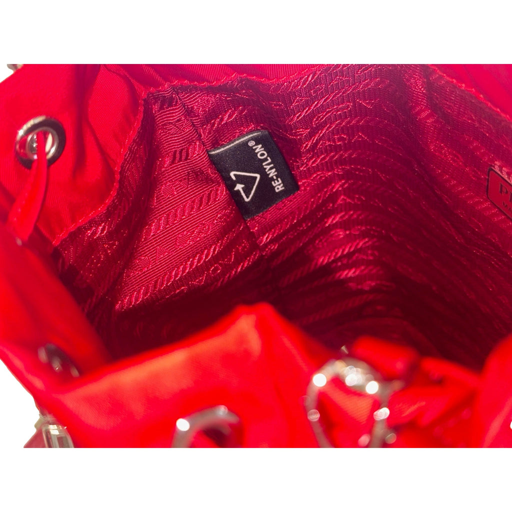 Prada Red Re-Nylon Bucket Bag - Crystal Handle & Versatile Style -   Shop Bags LLC