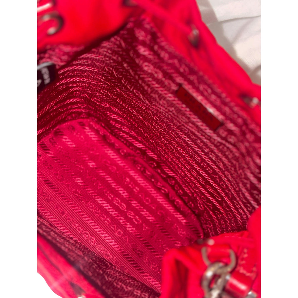 Prada Red Re-Nylon Bucket Bag - Crystal Handle & Versatile Style -   Shop Bags LLC