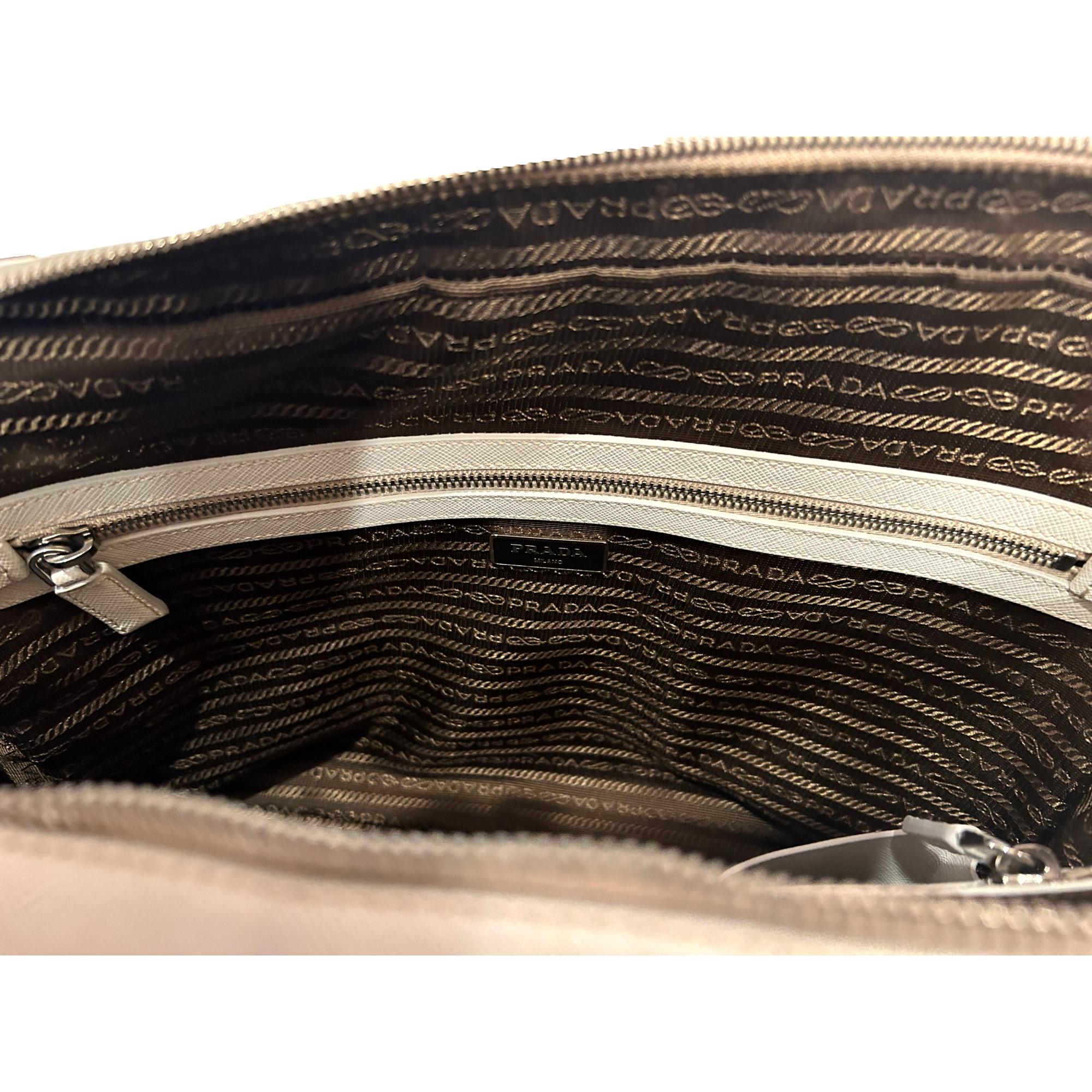 Prada’s Saffiano Leather Satchel in Ivory - Stylish & Practical Tote -   Shop Bags 