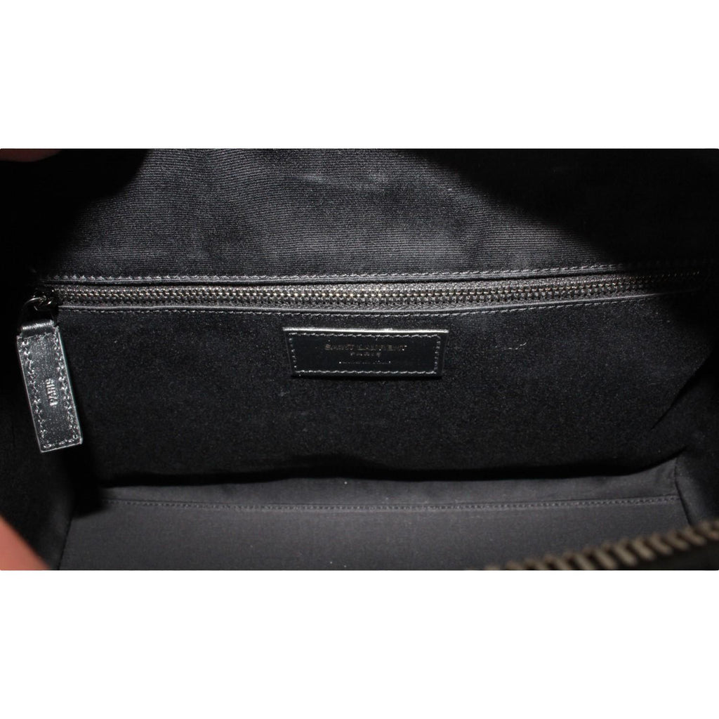 Saint Laurent Calfskin & Pony Hair Duffle Bag - Luxury & Versatile -   Shop Bags LLC