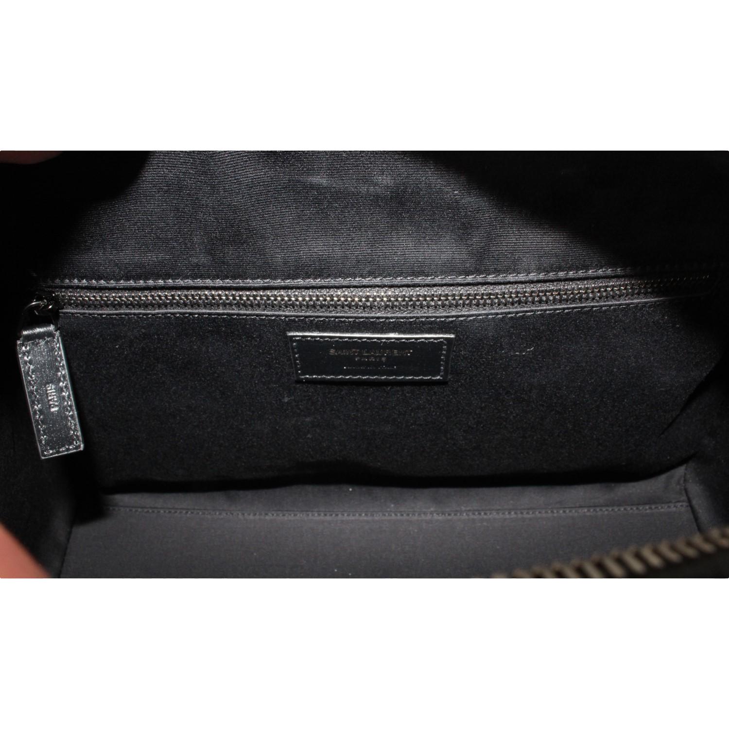 Saint Laurent Calfskin & Pony Hair Duffle Bag - Luxury & Versatile -   Shop Bags LLC