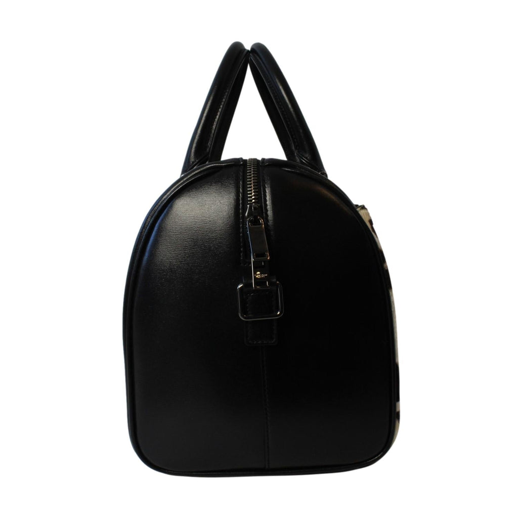 Saint Laurent Calfskin & Pony Hair Duffle Bag - Luxury & Versatile -   Shop Bags LLC