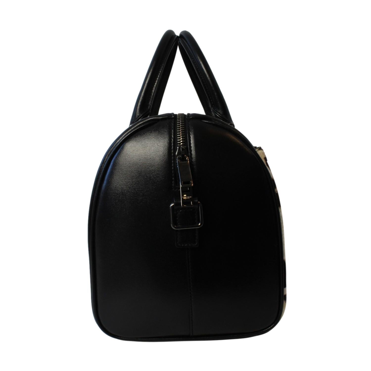 Saint Laurent Calfskin & Pony Hair Duffle Bag - Luxury & Versatile -   Shop Bags LLC