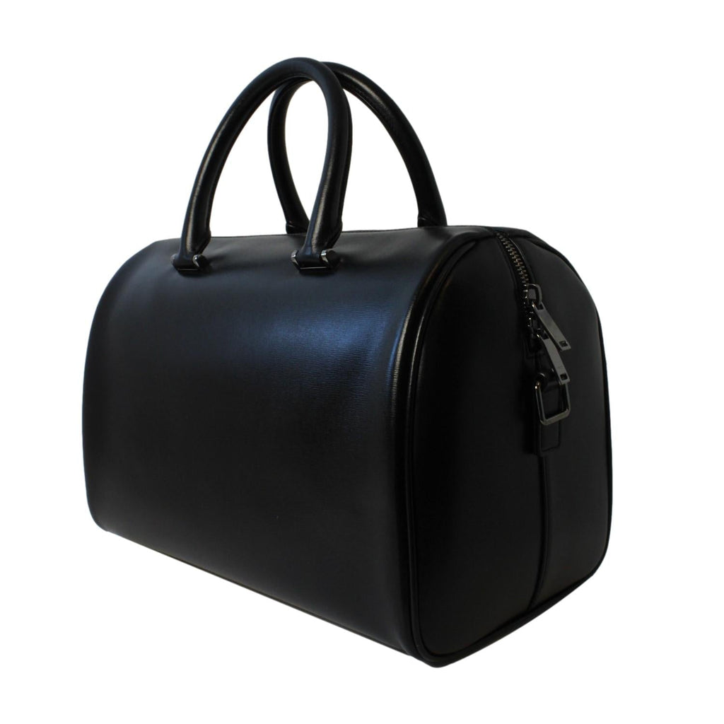 Saint Laurent Calfskin & Pony Hair Duffle Bag - Luxury & Versatile -   Shop Bags LLC