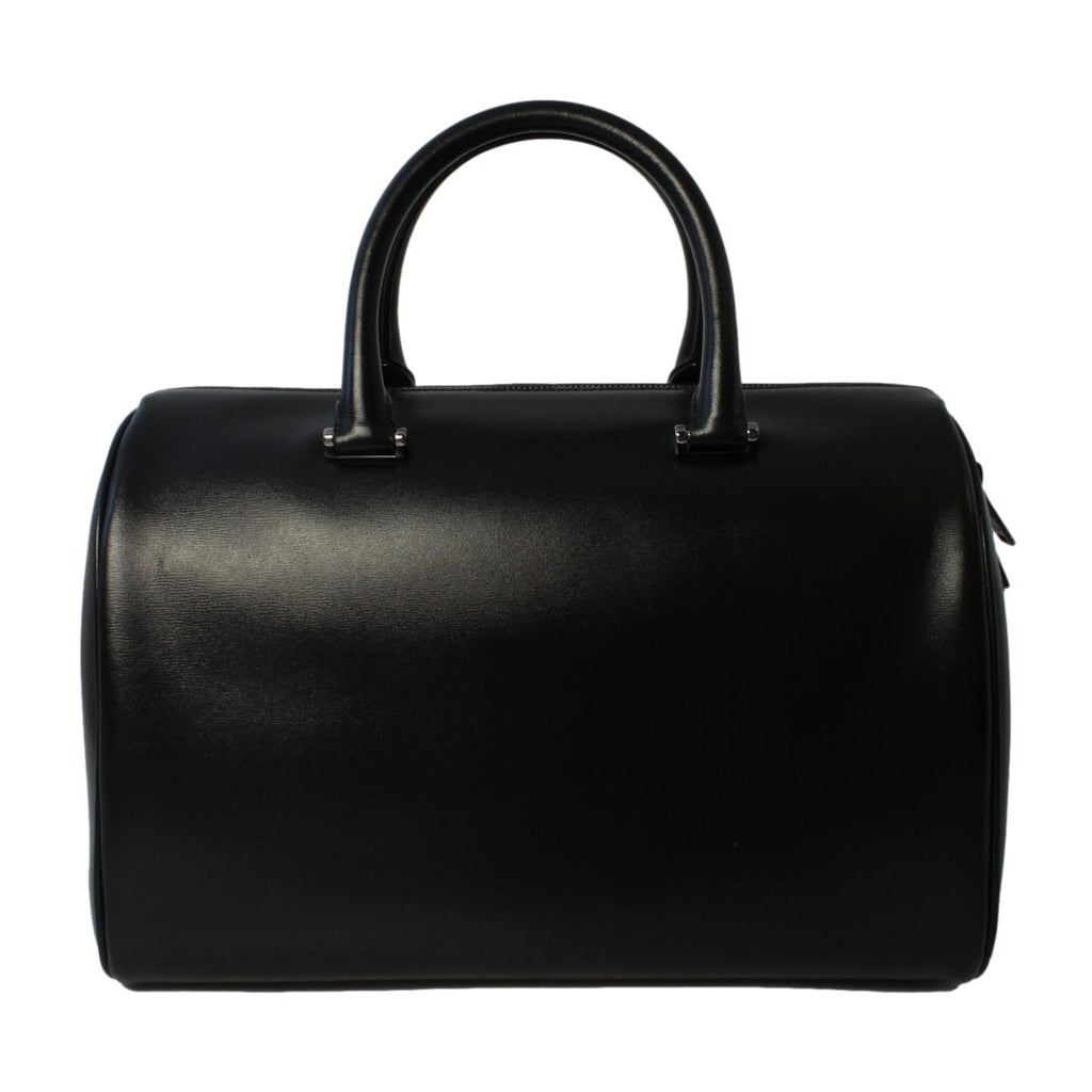 Saint Laurent Calfskin & Pony Hair Duffle Bag - Luxury & Versatile -   Shop Bags LLC