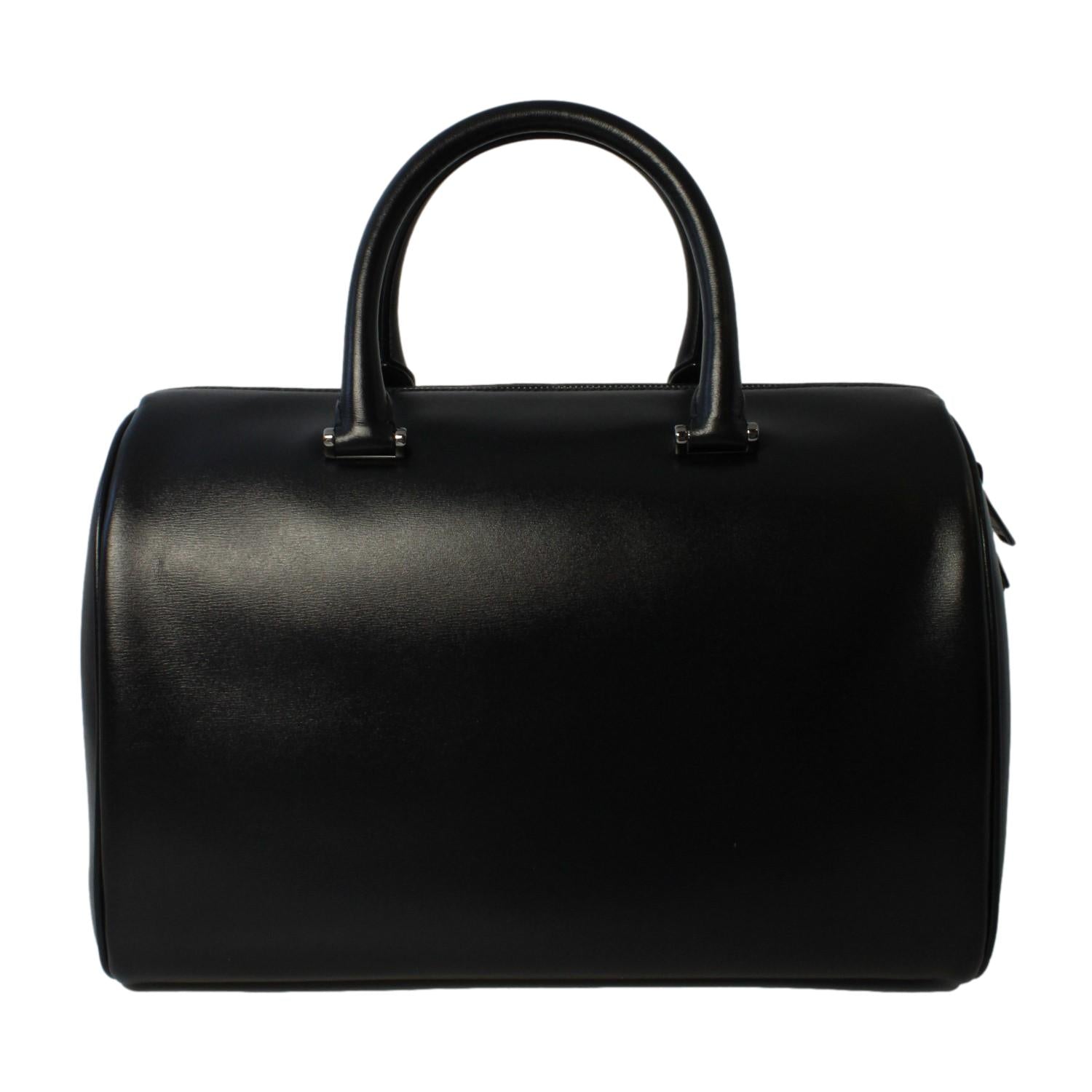 Saint Laurent Calfskin & Pony Hair Duffle Bag - Luxury & Versatile -   Shop Bags LLC