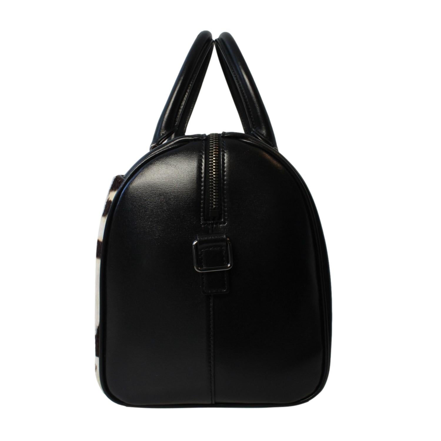 Saint Laurent Calfskin & Pony Hair Duffle Bag - Luxury & Versatile -   Shop Bags LLC