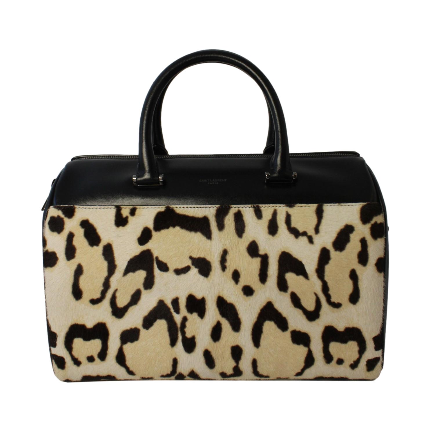 Saint Laurent Calfskin & Pony Hair Duffle Bag - Luxury & Versatile -   Shop Bags LLC