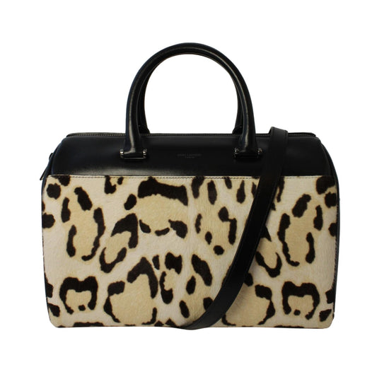 Saint Laurent Calfskin & Pony Hair Duffle Bag - Luxury & Versatile -   Shop Bags LLC