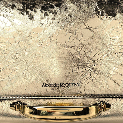 Small Story Gold Leather Bag - Elegant Alex McQueen Shoulder Accessory -   Shop Bags LLC 