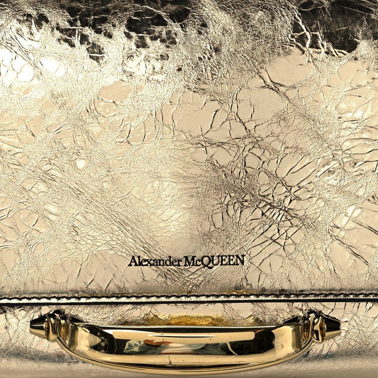 Small Story Gold Leather Bag - Elegant Alex McQueen Shoulder Accessory -   Shop Bags LLC 