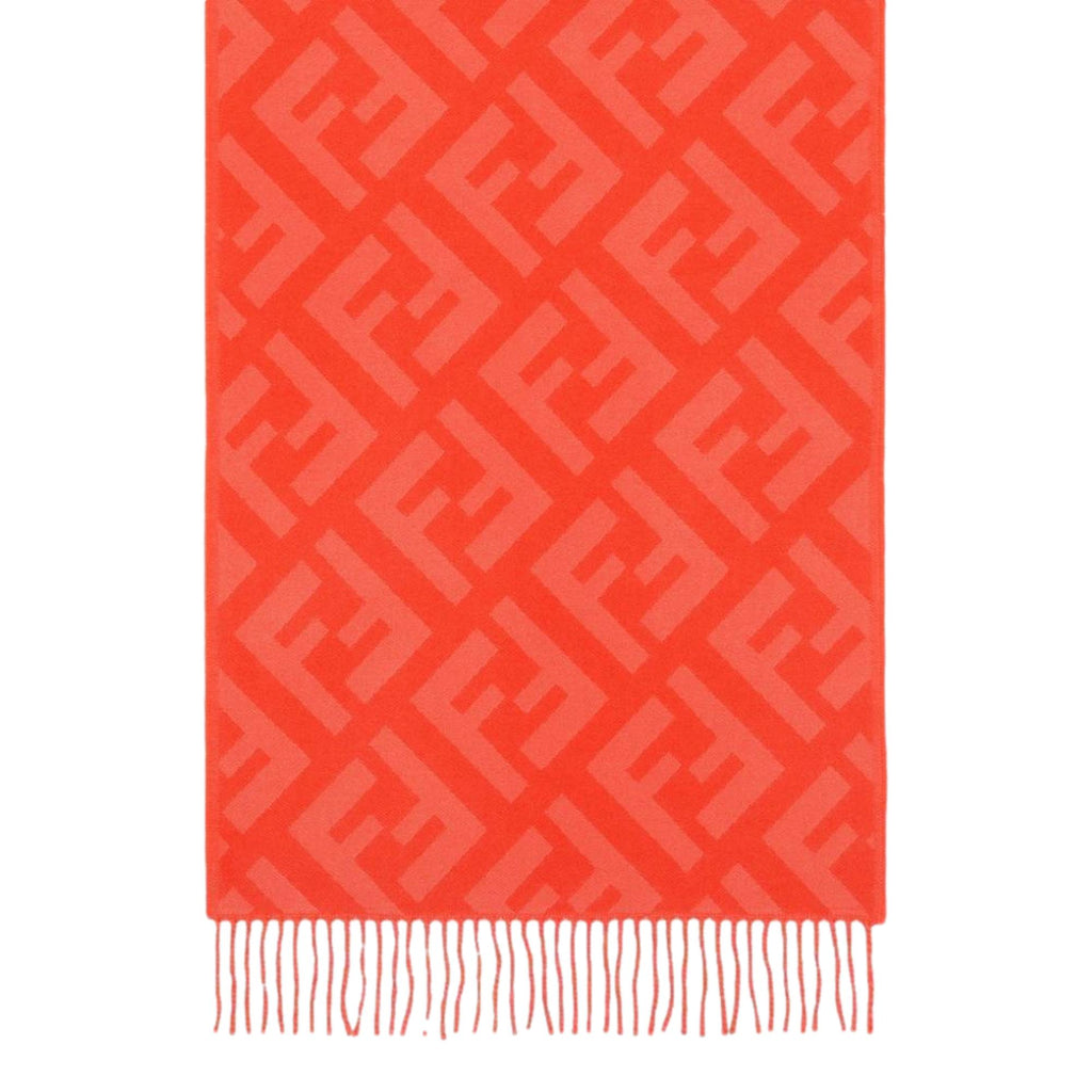 Luxurious Fendi Cashmere Scarf - Elegant FF Print & Coral Hue -  Elevate your winter style with this elegant cashmere scarf by Fendi. Crafted from luxuriously soft woven wool, it showcases the signature FF zucca pattern in a subtle tulip tone. The coral shade adds a refined touch while providing warmth and sophistication throughout the colder season. Model: FXT260Tulip ColorFF Logo printMeasurements: 140cm x 45cm Includes authenticity cards and dust bag Made in Italy Shop Bags 