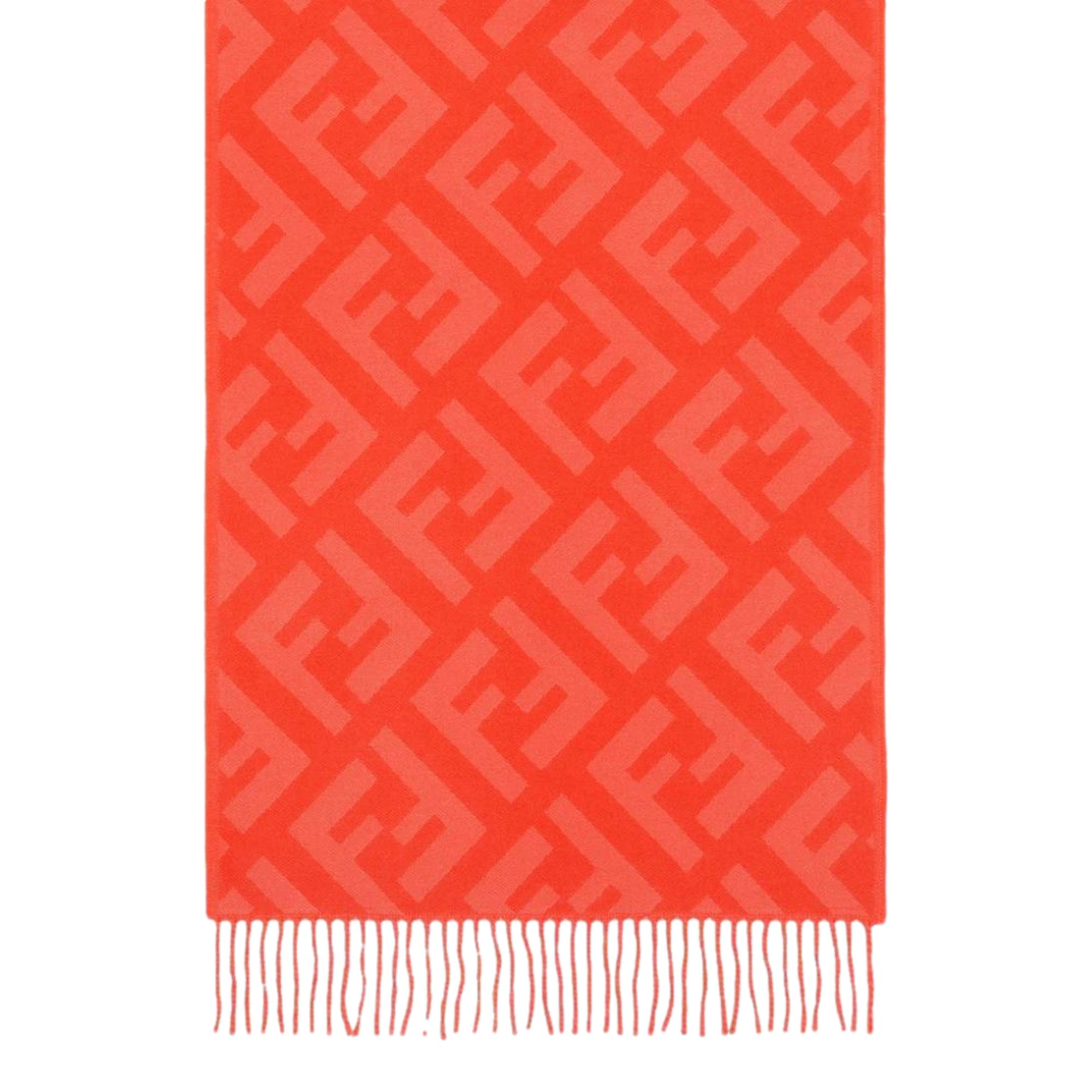 Luxurious Fendi Cashmere Scarf - Elegant FF Print & Coral Hue -  Elevate your winter style with this elegant cashmere scarf by Fendi. Crafted from luxuriously soft woven wool, it showcases the signature FF zucca pattern in a subtle tulip tone. The coral shade adds a refined touch while providing warmth and sophistication throughout the colder season. Model: FXT260Tulip ColorFF Logo printMeasurements: 140cm x 45cm Includes authenticity cards and dust bag Made in Italy Shop Bags 