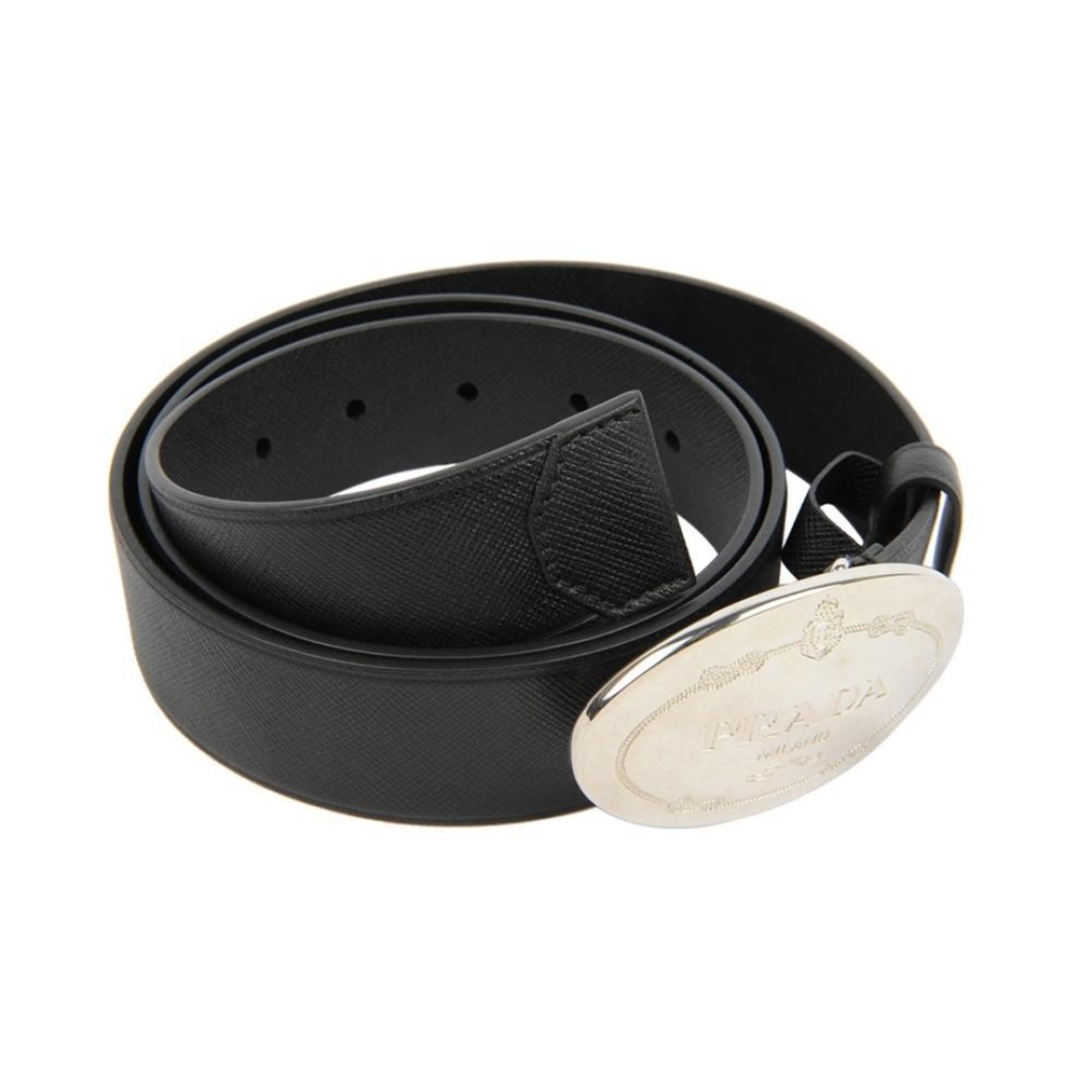 Prada Black Saffiano Leather Belt with Engraved Oval Buckle -  This Belt features black saffiano leather paired with a distinctive oval silver buckle engraved with the Prada logo. Its timeless design makes it a versatile accessory that complements any outfit with sophistication.Model: 2CM046Size: 110/44Black Saffiano LeatherSilver-toned hardwarePalladium plaque buckleIncludes Prada authenticity card and dust bagMade in Italy Shop Bags 