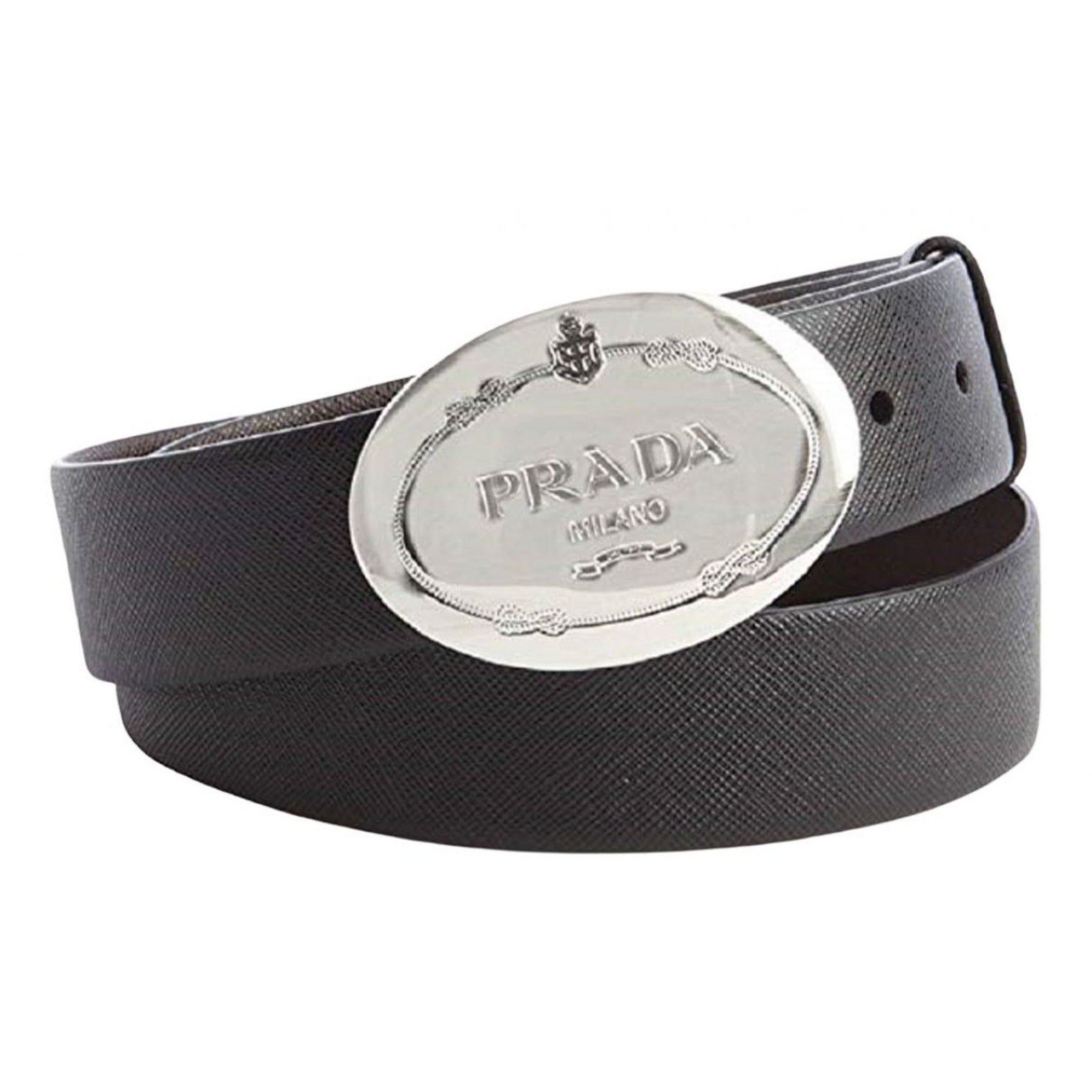 Prada Black Saffiano Leather Belt with Engraved Oval Buckle -  This Belt features black saffiano leather paired with a distinctive oval silver buckle engraved with the Prada logo. Its timeless design makes it a versatile accessory that complements any outfit with sophistication.Model: 2CM046Size: 110/44Black Saffiano LeatherSilver-toned hardwarePalladium plaque buckleIncludes Prada authenticity card and dust bagMade in Italy Shop Bags 