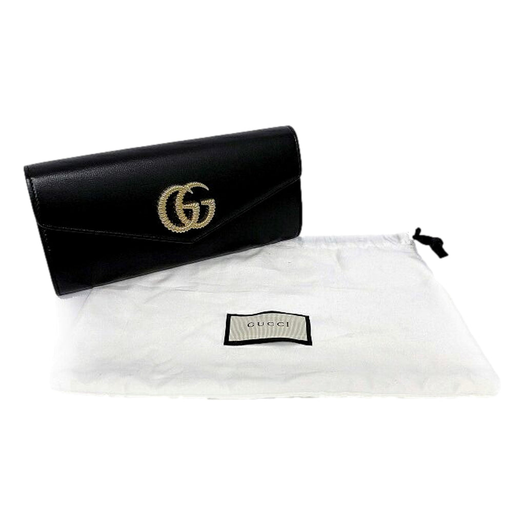 Gucci GG Black Leather Clutch - Elegant & Versatile Accessory