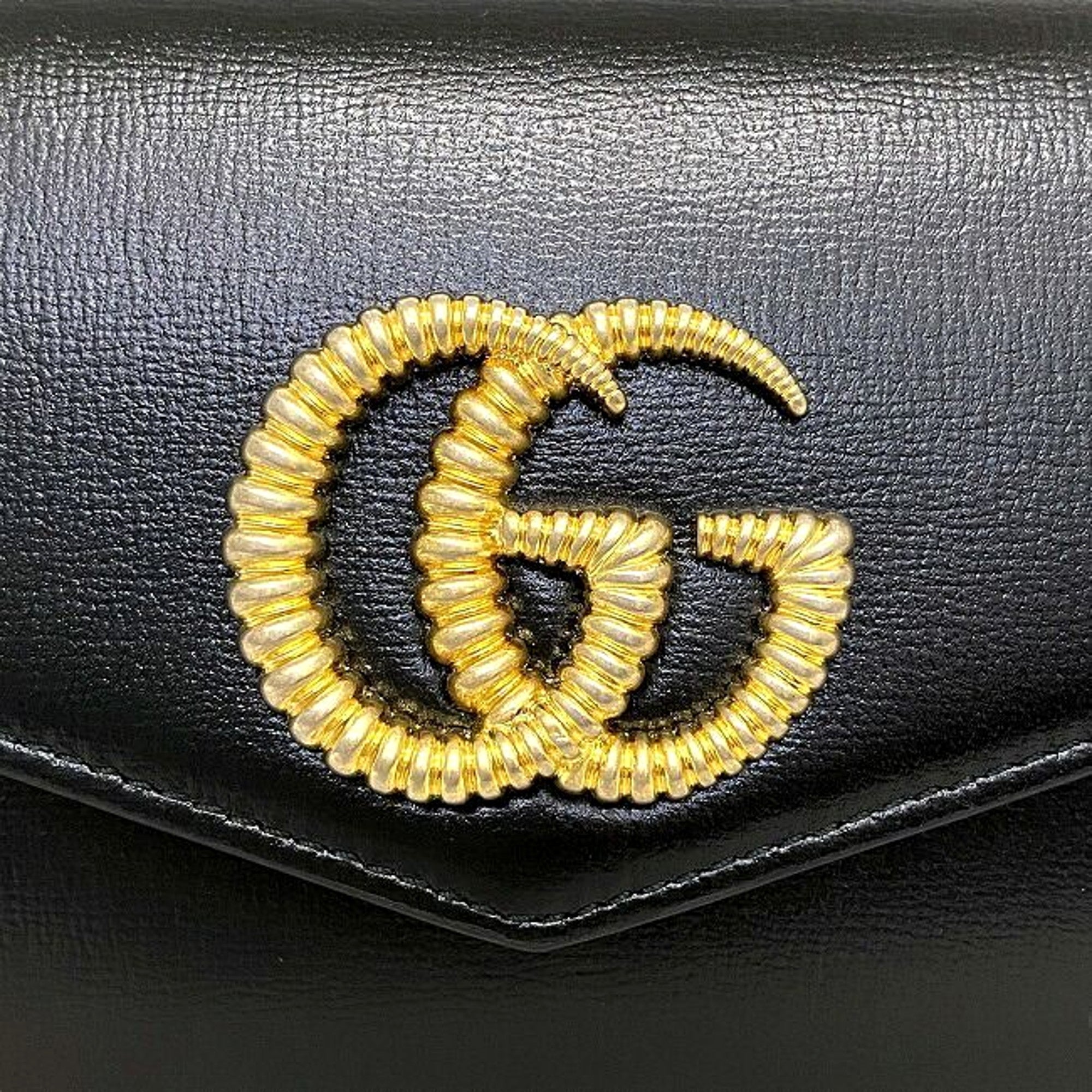 Gucci GG Black Leather Clutch - Elegant & Versatile Accessory