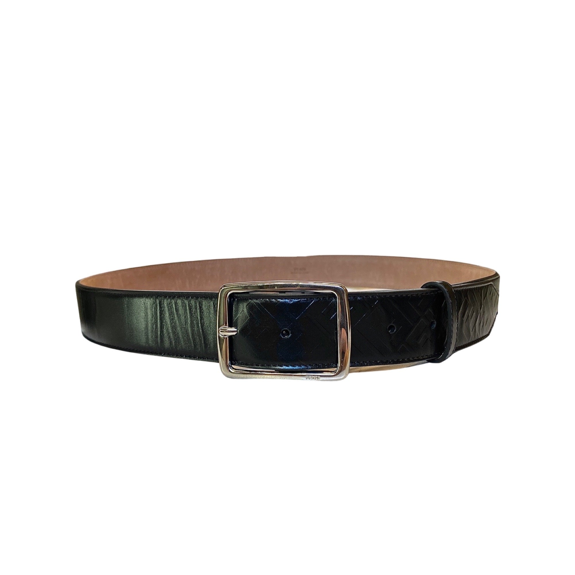 Fendi Belt: Smooth Black Leather with Silver Buckle - Perfect Fit -  This essential accessory effortlessly transitions between casual and formal looks. Made from smooth black calfskin leather, this Fendi Belt features a sleek silver-tone buckle and an adjustable fit, combining refined style with everyday comfort.Model: 7C0434Black calfskin leatherDebossed FF logo designSilver-tone buckleAdjustable up to 40"Includes authenticity cards and dust bagMade in Italy Shop Bags 