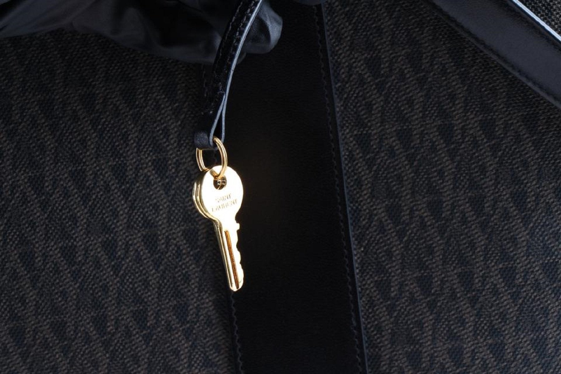 Luxury Travel in Style: Saint Laurent Large Monogram Luggage Case