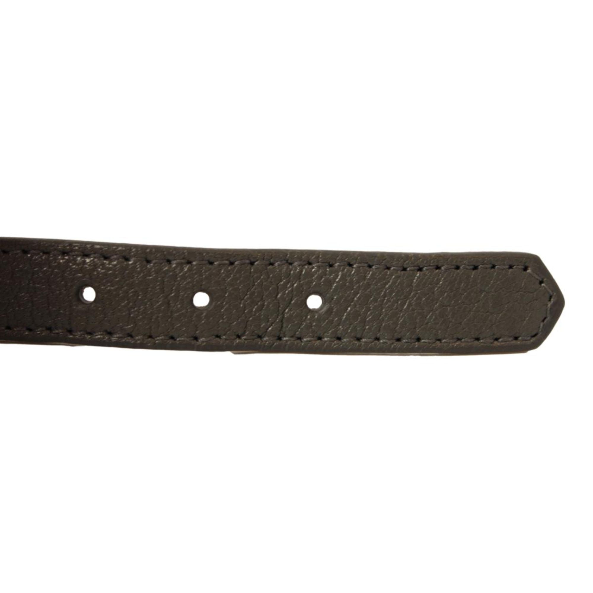 Balenciaga Arena Triple Wrap Studded Leather Bracelet - Dark Grey -  The Balenciaga Arena Triple Tour Wrap Bracelet, crafted from glossy leather, offers a refined yet casual accent to your collection. This elegant leather wrap bracelet introduces a discreet touch of sophistication to any outfit. Model: 390643Arena Triple Tour WrapDark grey leatherGold-tone hardwareBuckle closureMeasurements: Length 20.2“, Width 0.8"Includes authenticity card and boxMade in Italy Shop Bags 
