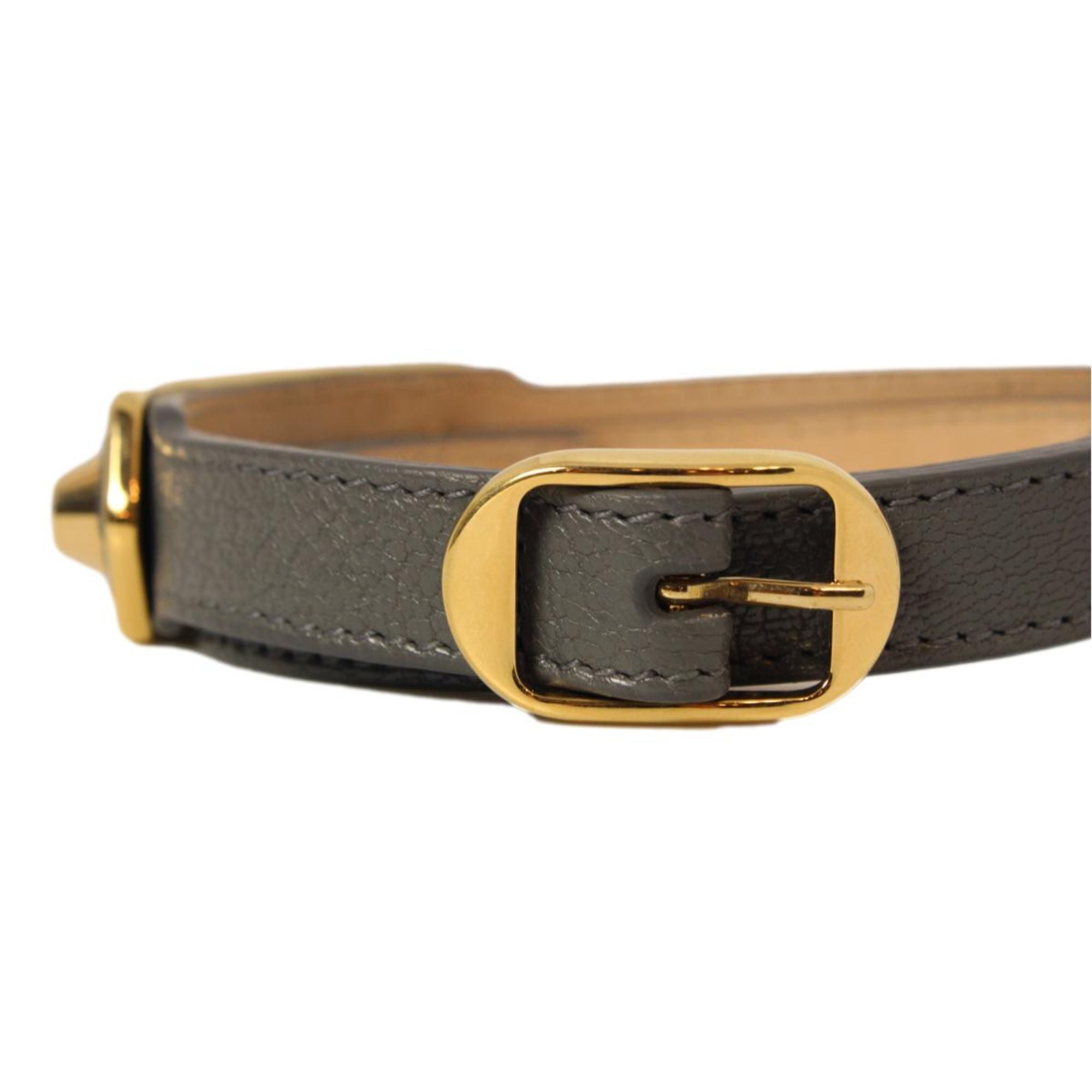 Balenciaga Arena Triple Wrap Studded Leather Bracelet - Dark Grey -  The Balenciaga Arena Triple Tour Wrap Bracelet, crafted from glossy leather, offers a refined yet casual accent to your collection. This elegant leather wrap bracelet introduces a discreet touch of sophistication to any outfit. Model: 390643Arena Triple Tour WrapDark grey leatherGold-tone hardwareBuckle closureMeasurements: Length 20.2“, Width 0.8"Includes authenticity card and boxMade in Italy Shop Bags 