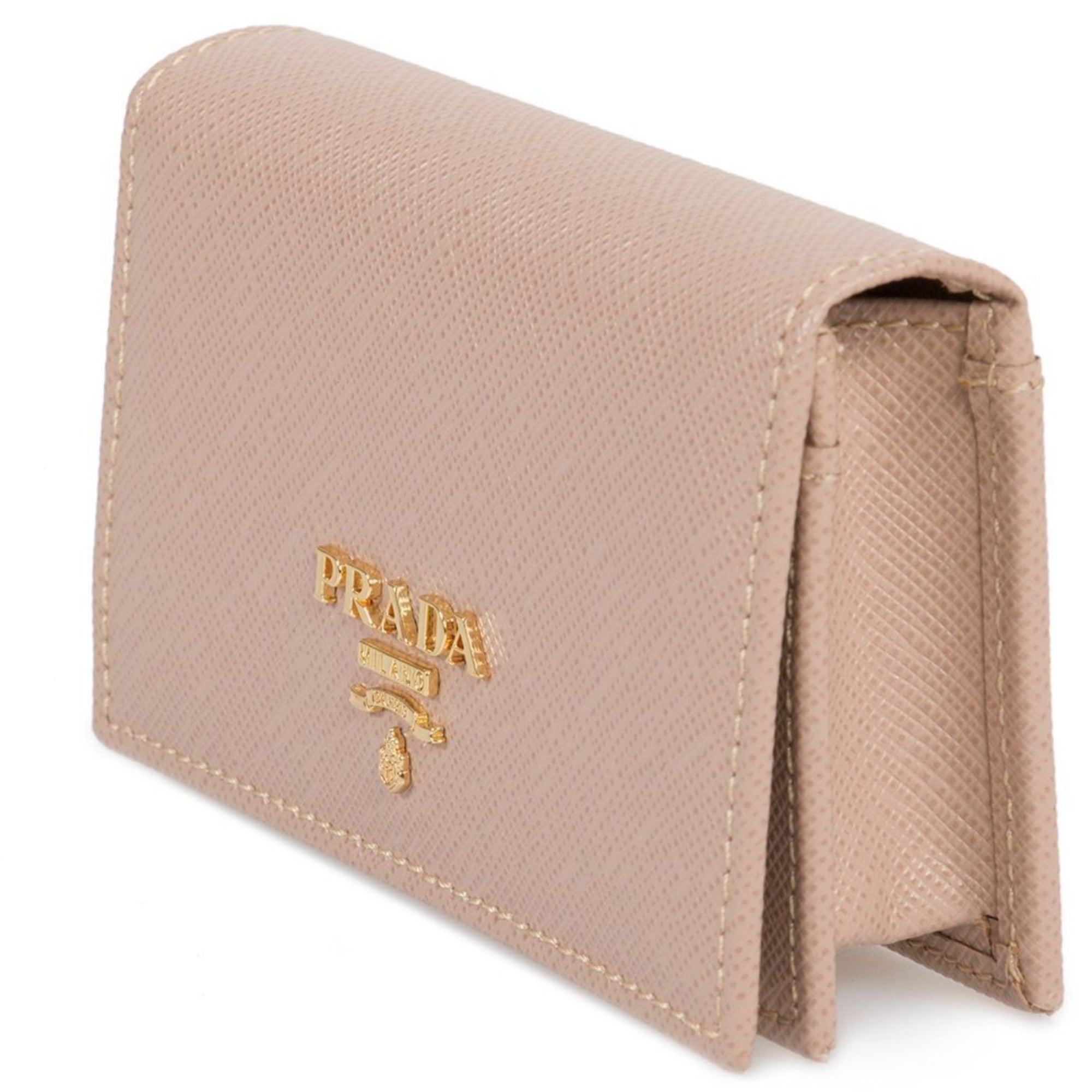 Prada Saffiano Leather Card Holder – Elegant Beige with Gold Logo -  This Prada saffiano beige Card Holder wallet is the perfect size for your personal necessities. The gold Prada Milano logo looks amazing with the beige saffiano leather. Includes authenticity cards and Prada box. Model: 1MC122Cammeo beige saffiano leather Gold-tone hardwareGold Prada Milano logo Snap closureThree card slotsMeasurements: 4.5" x 1" x 2.5" (LWH)Includes authenticity cards and Prada box Made in Italy Shop Bags 