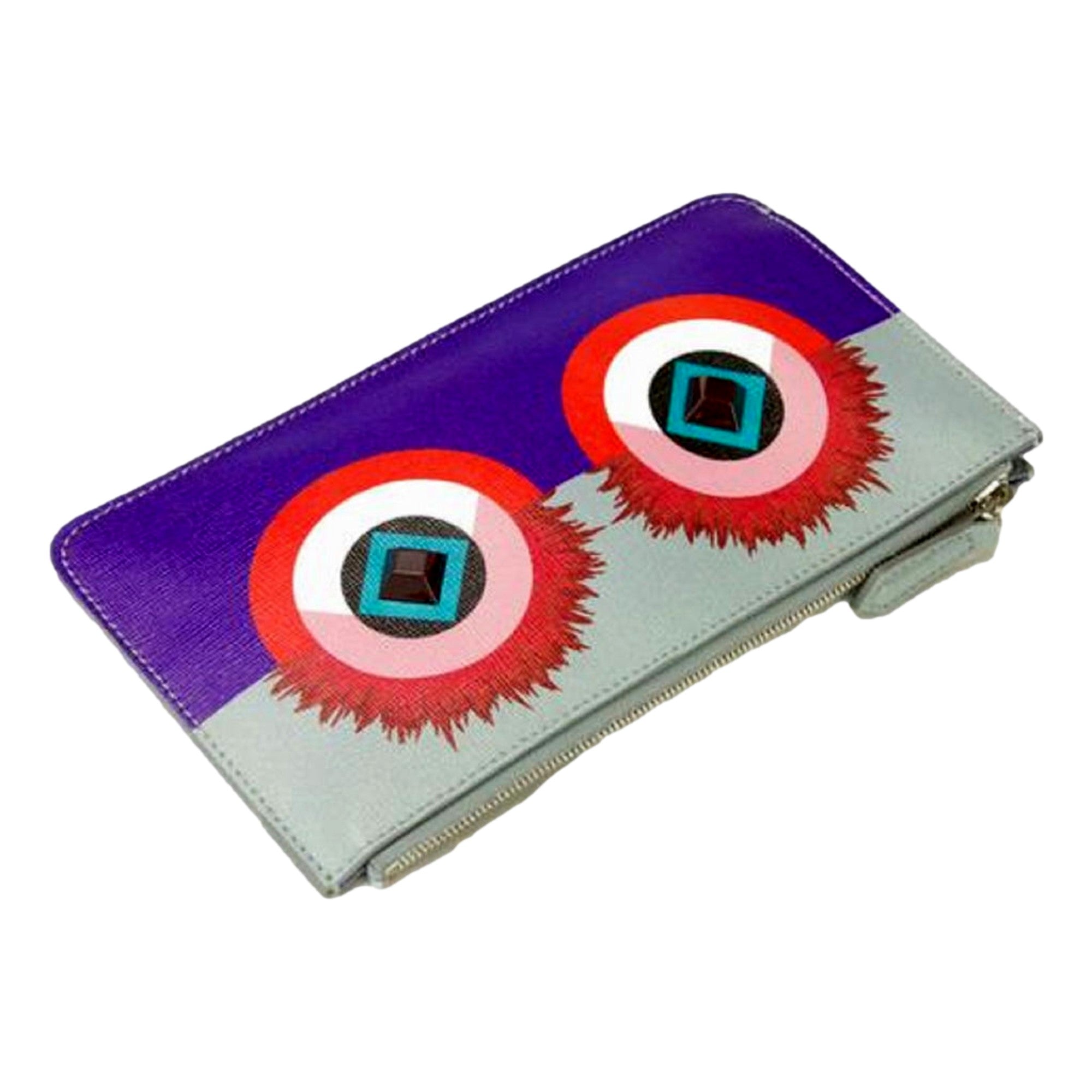 Fendi Monster Clutch: Vibrant Purple Blue Leather Pouch -  This charming Fendi Monster Pouch is an ideal companion for an enjoyable evening. Use it solo, as a wallet, or a cosmetic bag to introduce a vibrant splash of color and sophistication to your ensemble. Model: 8M0341Purple and Blue Leather Silver-tone hardwareZip top closureBlue canvas interior lining Measurements: 7.5" x 0.2"x 4.5" (LWH)Includes authenticity cards and Fendi dust bag Made in Italy Shop Bags 