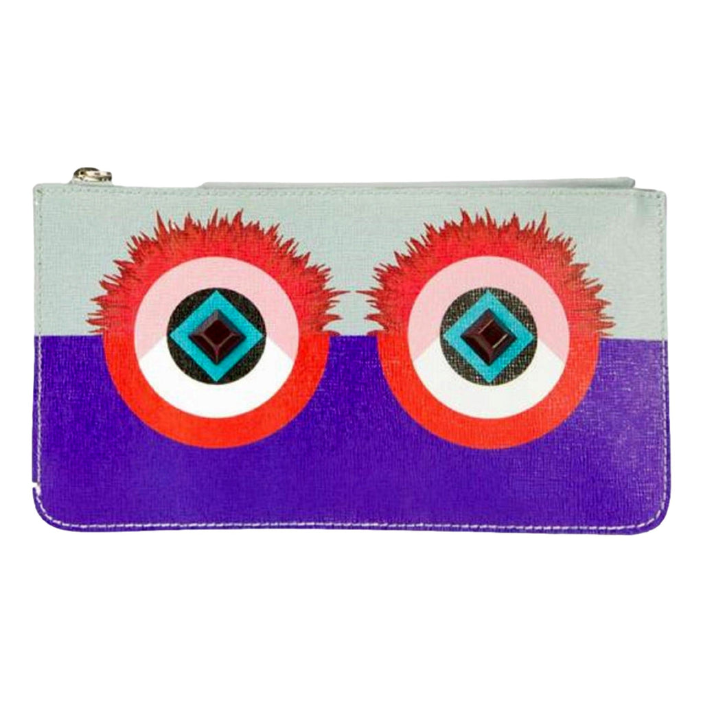 Fendi Monster Clutch: Vibrant Purple Blue Leather Pouch -  This charming Fendi Monster Pouch is an ideal companion for an enjoyable evening. Use it solo, as a wallet, or a cosmetic bag to introduce a vibrant splash of color and sophistication to your ensemble. Model: 8M0341Purple and Blue Leather Silver-tone hardwareZip top closureBlue canvas interior lining Measurements: 7.5" x 0.2"x 4.5" (LWH)Includes authenticity cards and Fendi dust bag Made in Italy Shop Bags 
