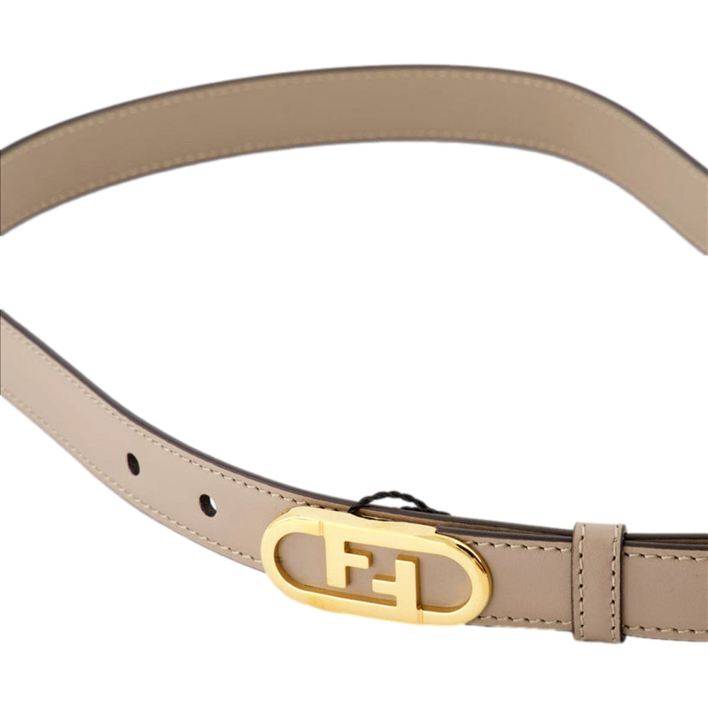 Shop Fendi Women's Belt - Elegant Grey Tortora O'Lock - Size 80 -  The Fendi Tortora O'Lock Belt showcases an elegant and refined style, crafted from smooth leather and highlighted by a striking gold Fendi O'Lock buckle. Its adjustable fit and prominent metallic logo lettering blend practicality with high fashion seamlessly. This accessory is essential for enhancing any ensemble. Size 80.8C0652 Shop Bags 
