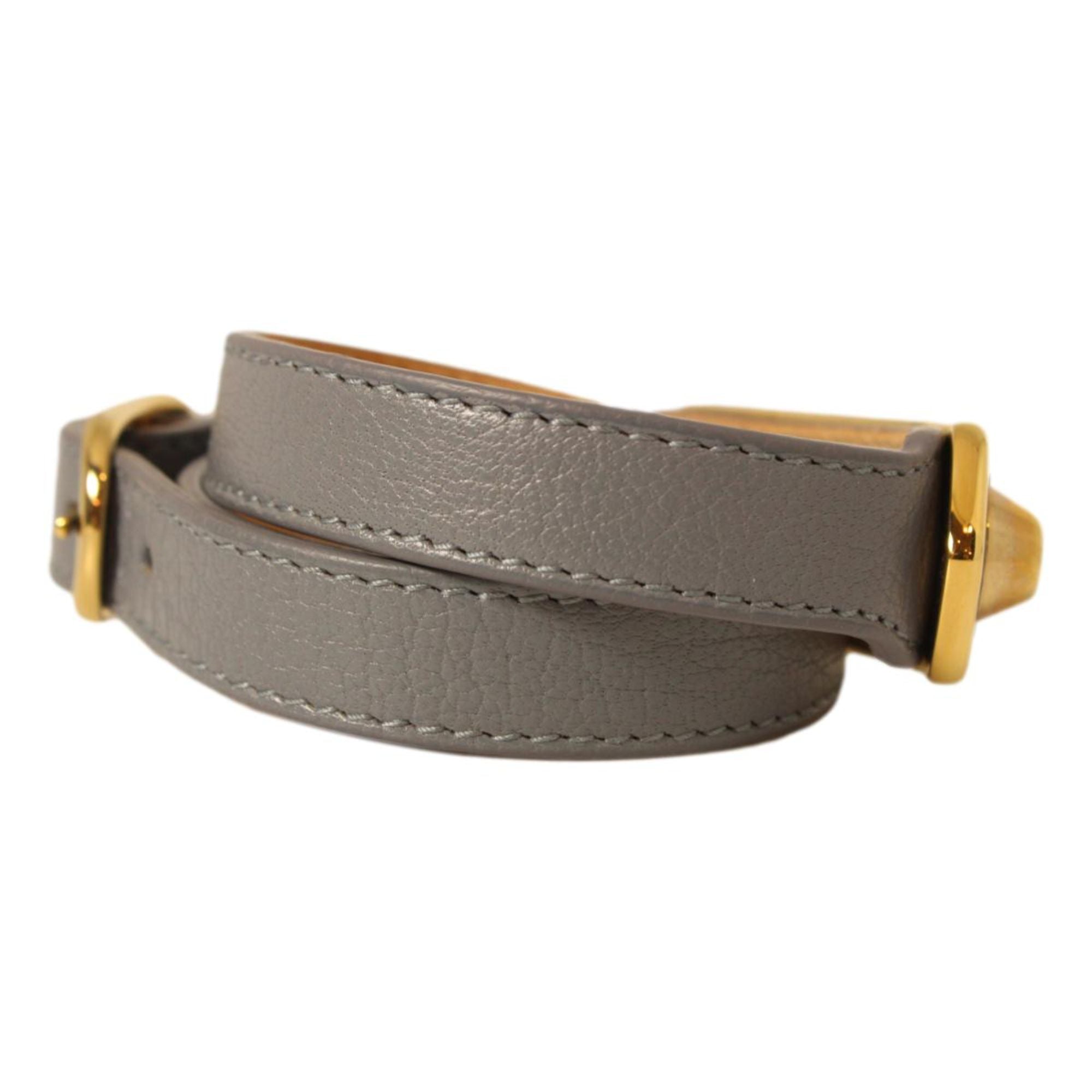 Balenciaga Arena Bleu Acier Glossy Leather Wrap Bracelet -  The Balenciaga Arena Triple Tour Wrap Bracelet, crafted from glossy goat leather, offers a refined yet casual accent to your collection. This elegant wrap bracelet adds a discreet touch of sophistication to any outfit. Dimensions: Length 20.2", Width 0.8". Model: 390643, Size: Small, Color: Bleu Acier. Comes with an authenticity card and box. Made in Italy. Shop Bags 